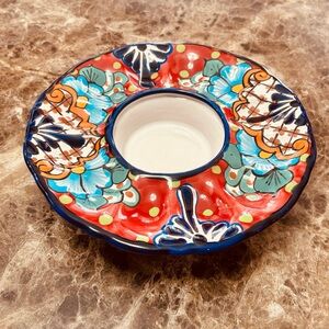 Hand-painted Mexican Talavera ceramic egg dish with a central well.